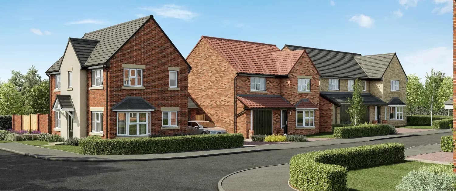 Street scene of a modern new-build housing development in the UK with brick houses and manicured hedges